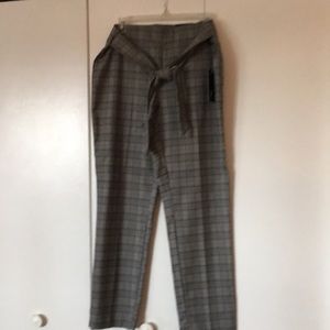 Long pant with tie belt.